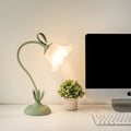 Lampada floreale a fioritura regolabile — alimentata tramite USB, base in ghisa verde, petali in acrilico trasparente