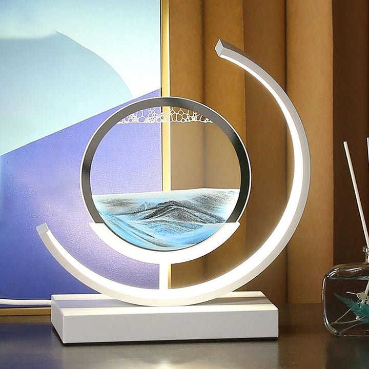 Stolní LED lampa Sandlight Quicksand — animovaná písková socha