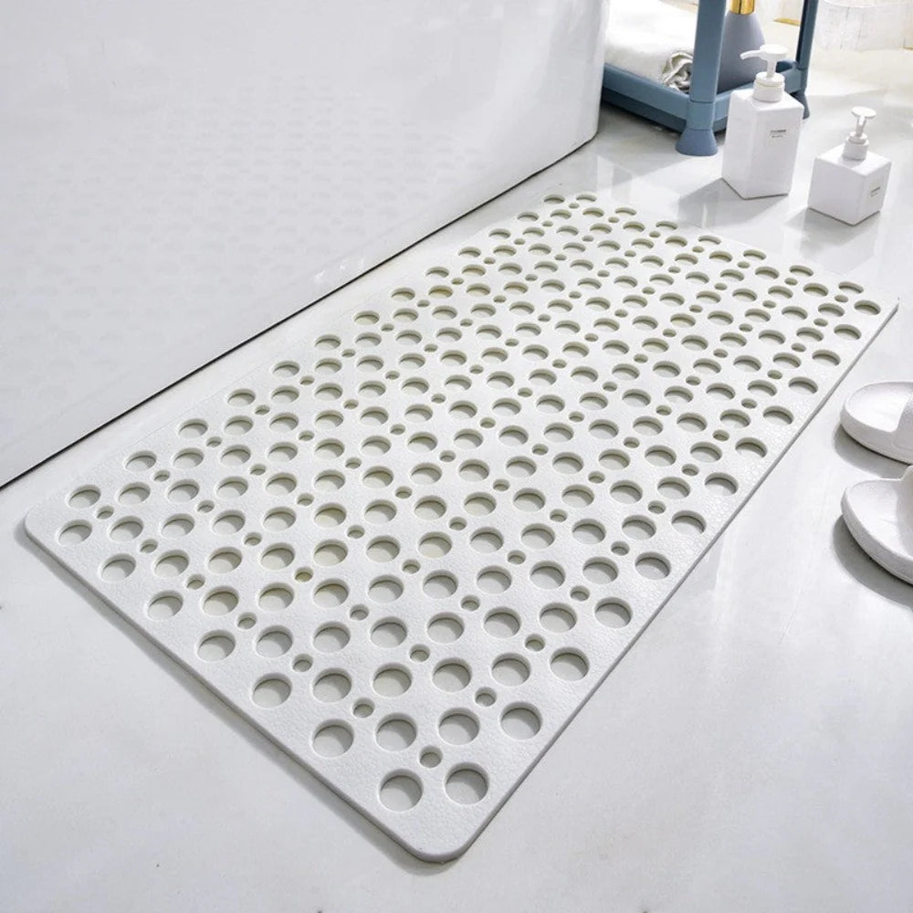 Flexibele badmat van pvc — achterkant met zuignappen en geperforeerde afvoergaten