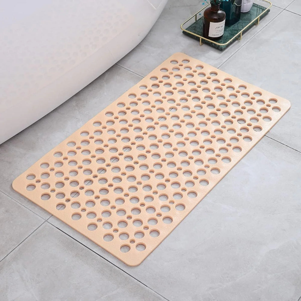 Flexibele badmat van pvc — achterkant met zuignappen en geperforeerde afvoergaten