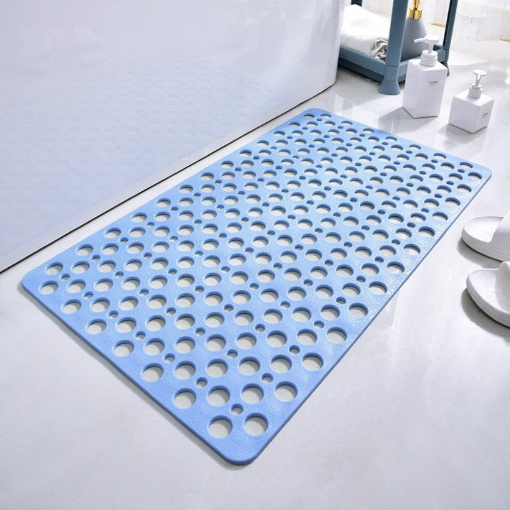 Flexibele badmat van pvc — achterkant met zuignappen en geperforeerde afvoergaten