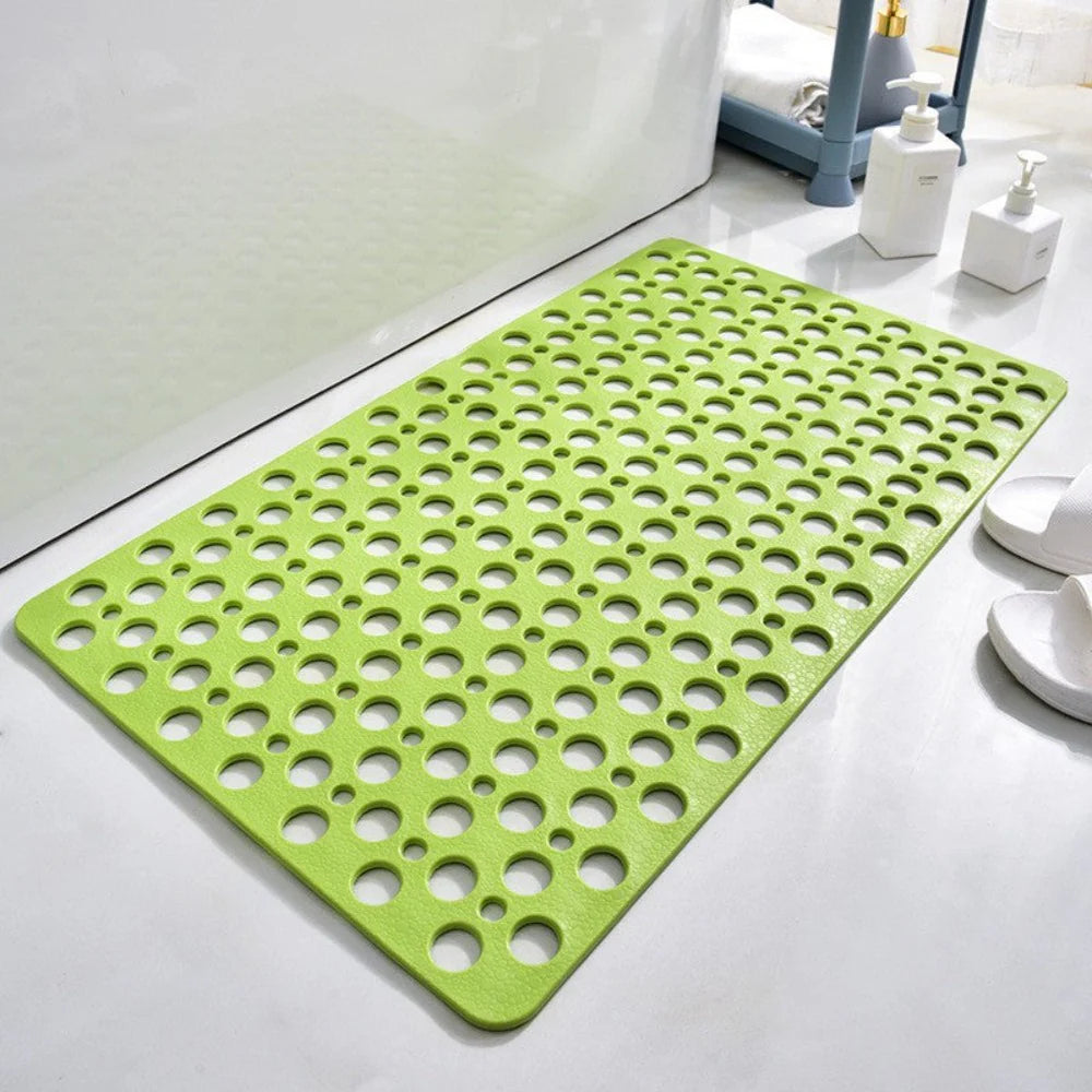 Flexibele badmat van pvc — achterkant met zuignappen en geperforeerde afvoergaten