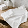The Fleece Company hætteklæde i muslin til baby til badetid