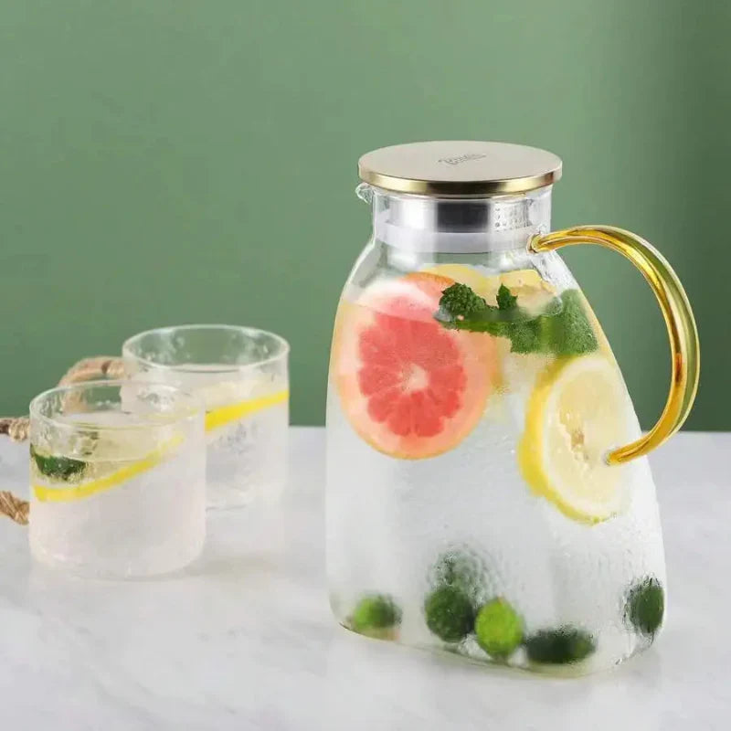 Carafă din sticlă borosilicată — rezistentă la căldură și frig, cu capac și mâner