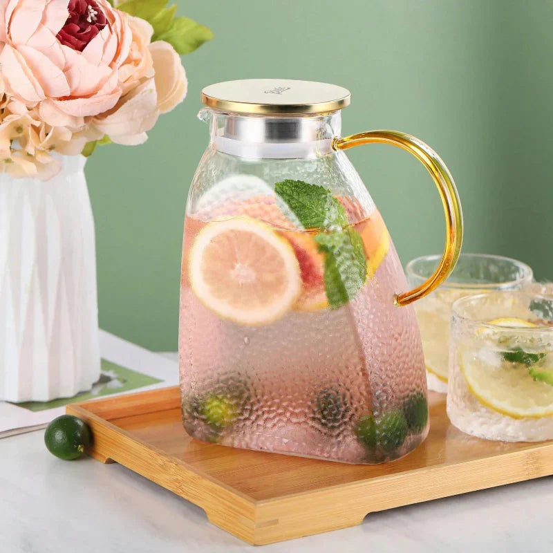 Carafă din sticlă borosilicată — rezistentă la căldură și frig, cu capac și mâner