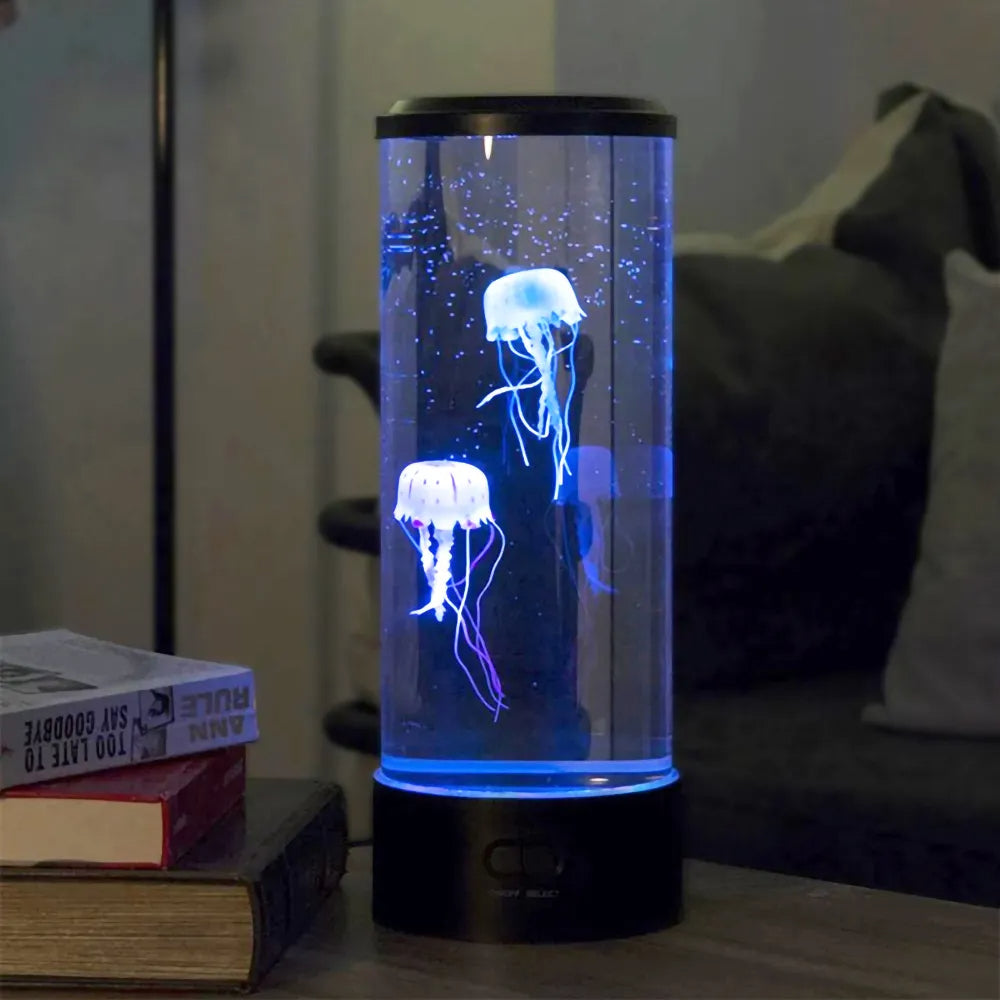 مصباح طاولة LED على شكل قنديل بحر — عرض ألوان، أسطوانة شفافة، ارتفاع 26cm وقطر 9cm