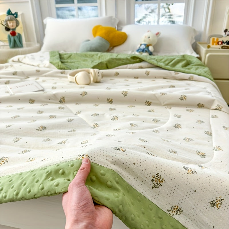 Åndbart blomstret quiltet tæppe — let vævning, konstant luftgennemstrømning