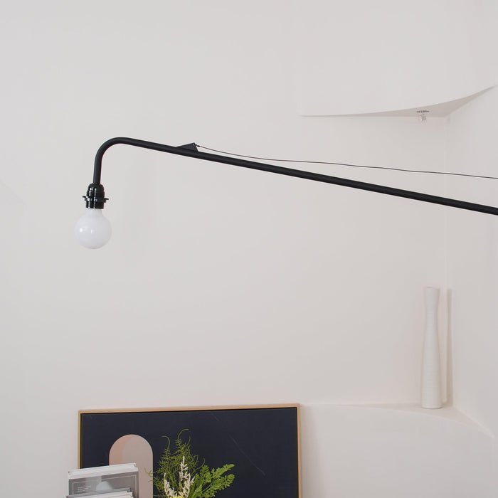 Minimalistické černé kovové nastavitelné LED nástěnné svítidlo pro moderní interiéry