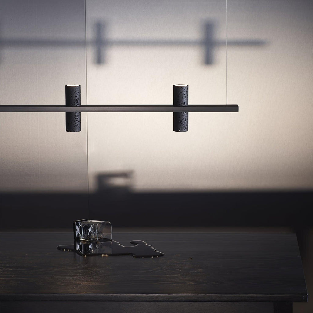 Minimalist Chandelier With Black Travertine Pillars And Copper Accent