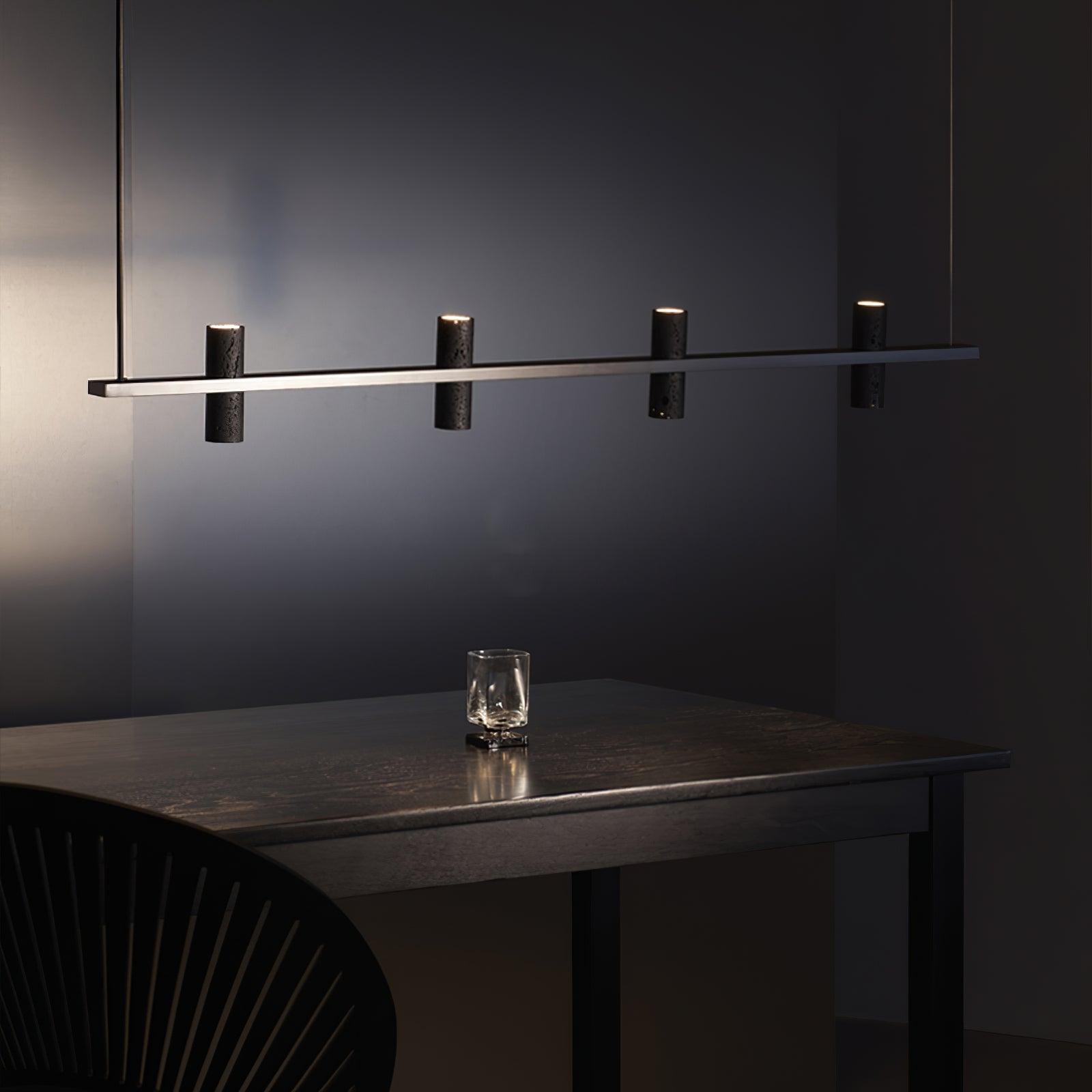 Minimalist Chandelier With Black Travertine Pillars And Copper Accent