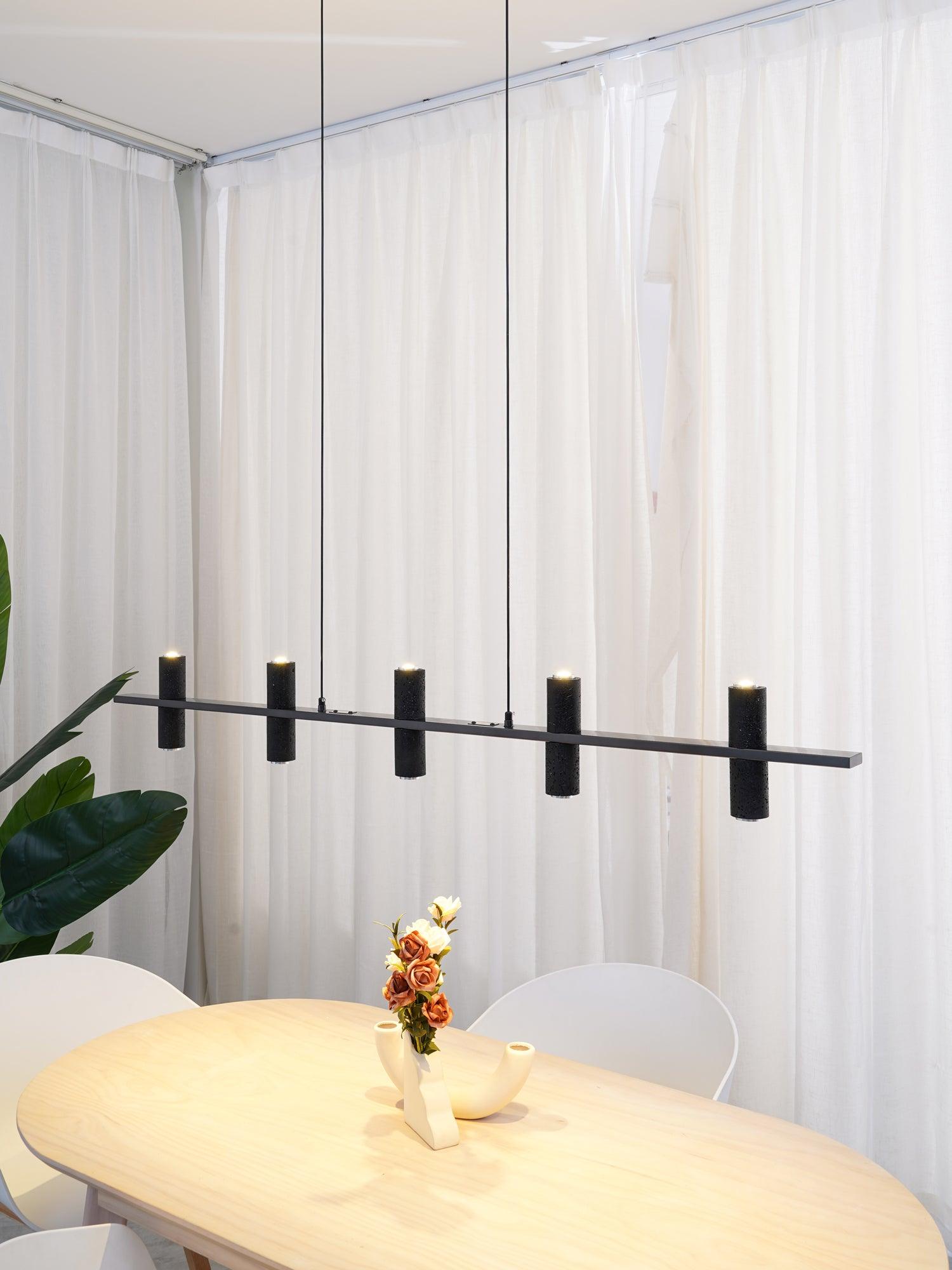 Minimalist Chandelier With Black Travertine Pillars And Copper Accent