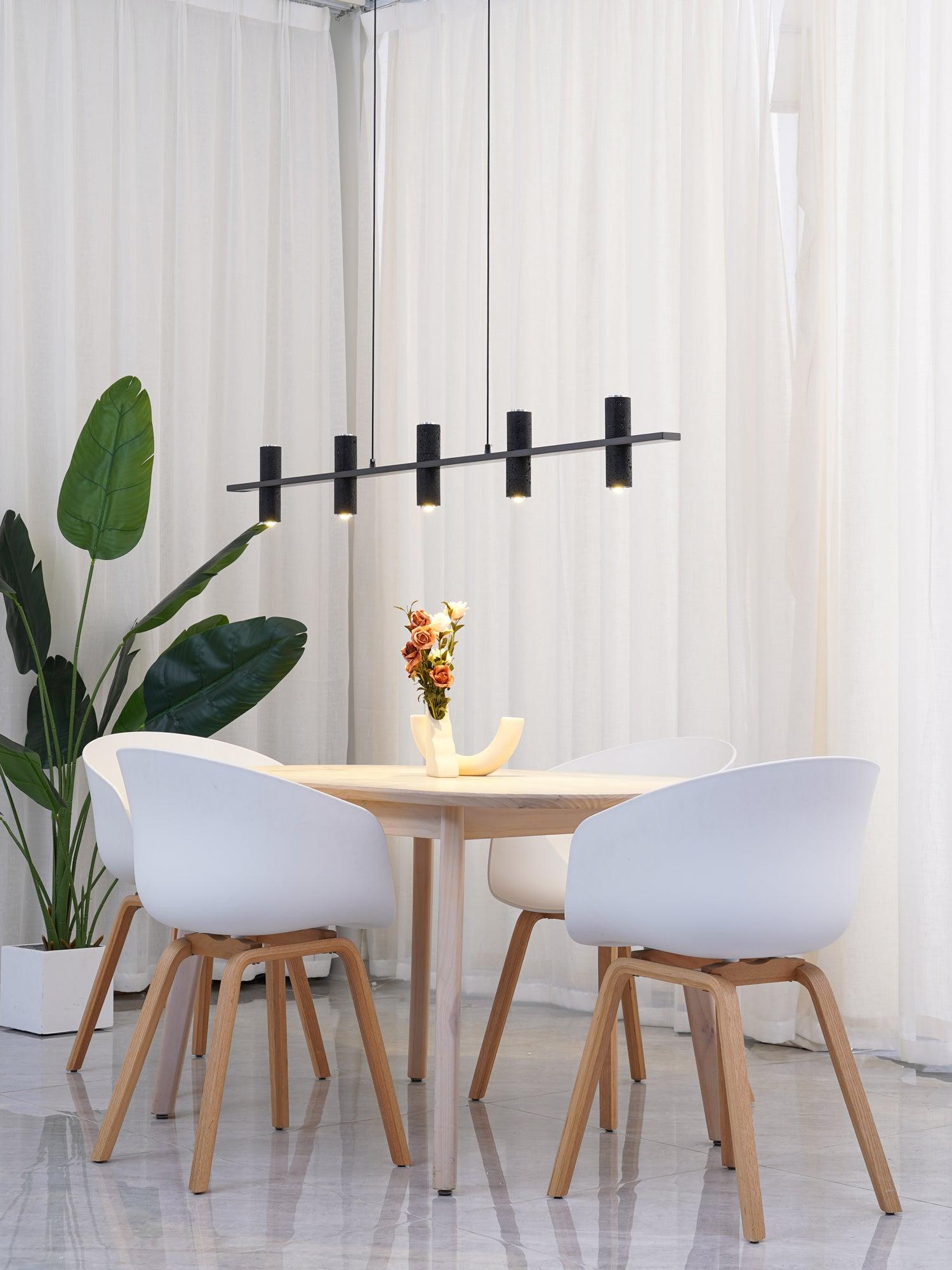 Minimalist Chandelier With Black Travertine Pillars And Copper Accent