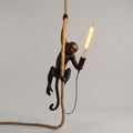 LuminMonkey skulpturell ape-pendellampe — varmt lys