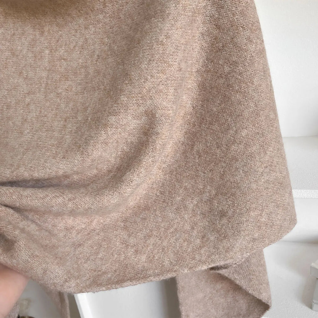 The Fleece Shawl With Elegant Draping And Lightweight Warmth