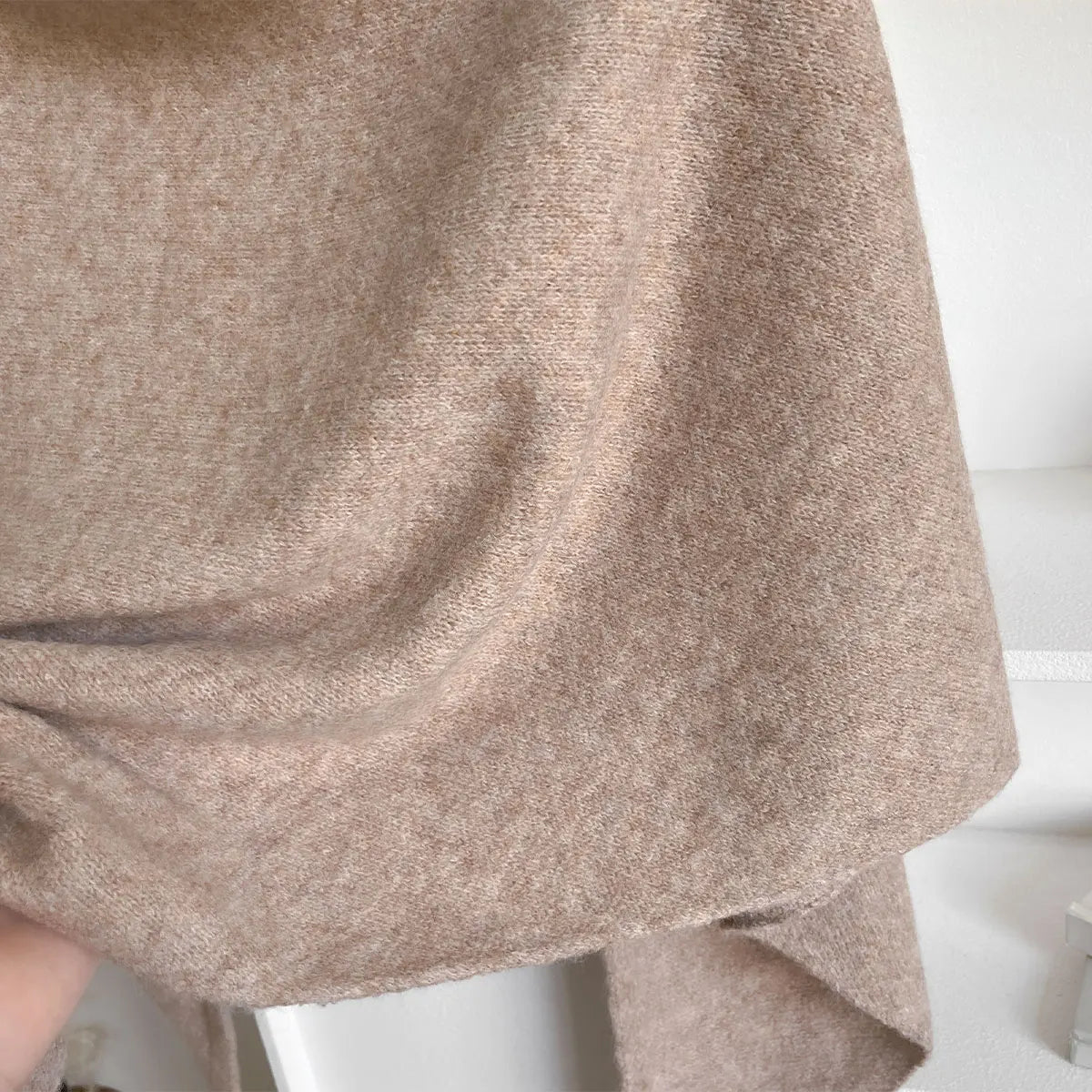 The Fleece Shawl With Elegant Draping And Lightweight Warmth