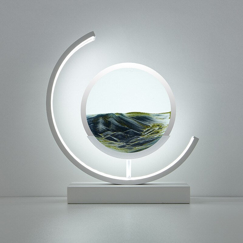 Stolní LED lampa Sandlight Quicksand — animovaná písková socha