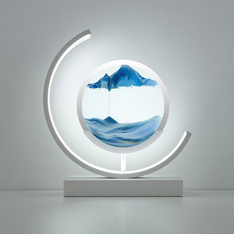 Stolní LED lampa Sandlight Quicksand — animovaná písková socha