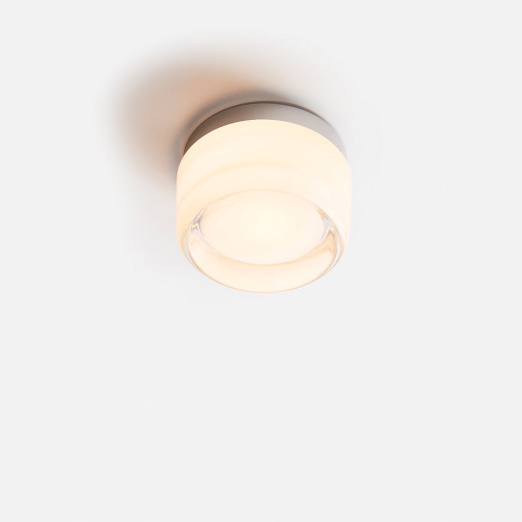 Dimple LED-væglampe — tekstureret glas, diameter på 10–12cm