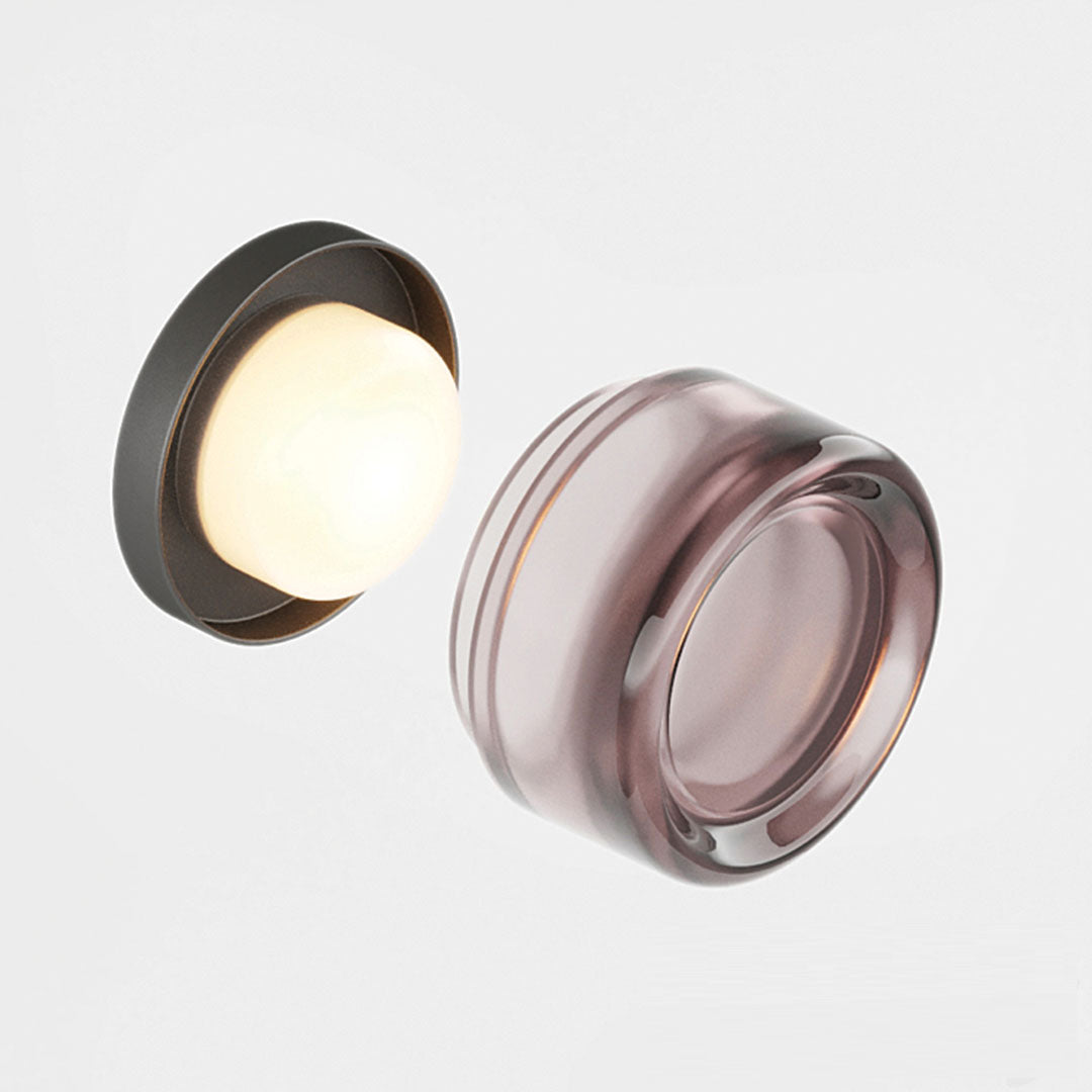 Dimple LED-væglampe — tekstureret glas, diameter på 10–12cm