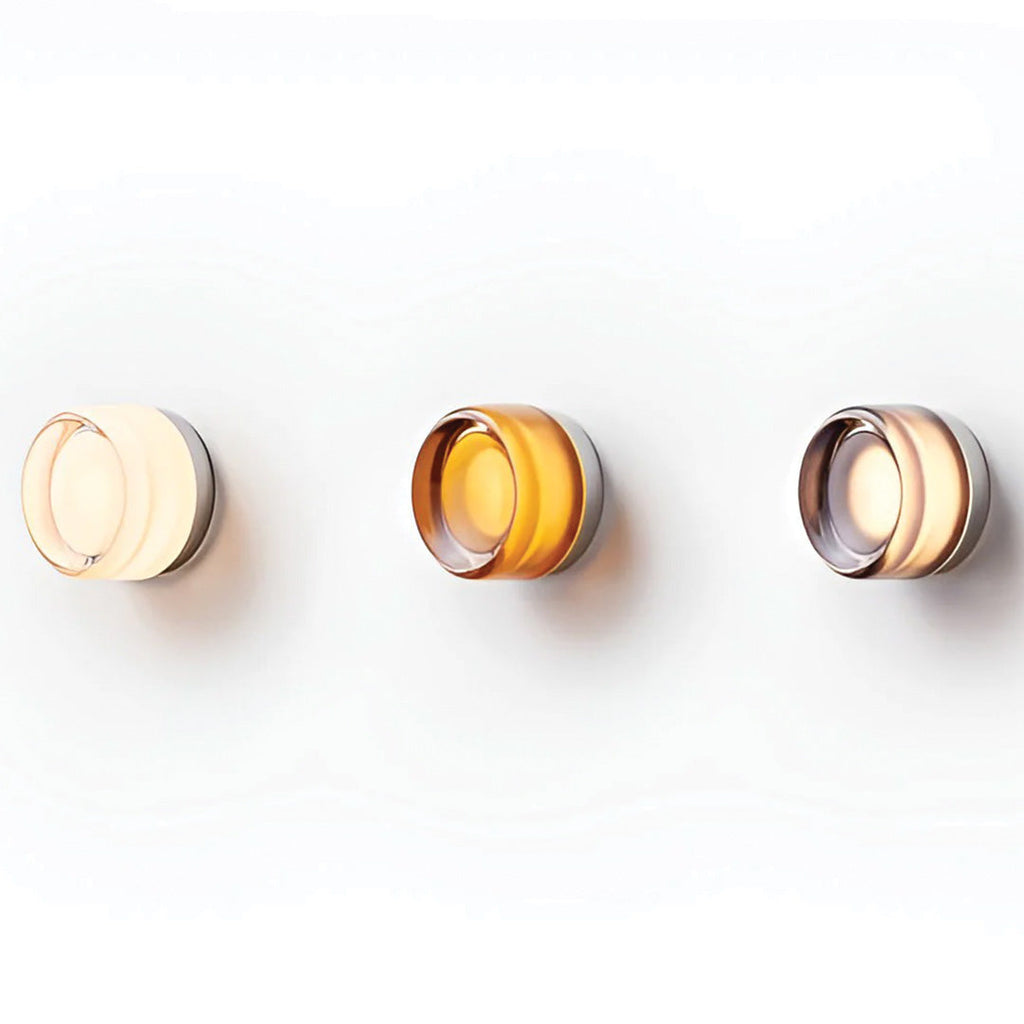 Dimple LED-væglampe — tekstureret glas, diameter på 10–12cm