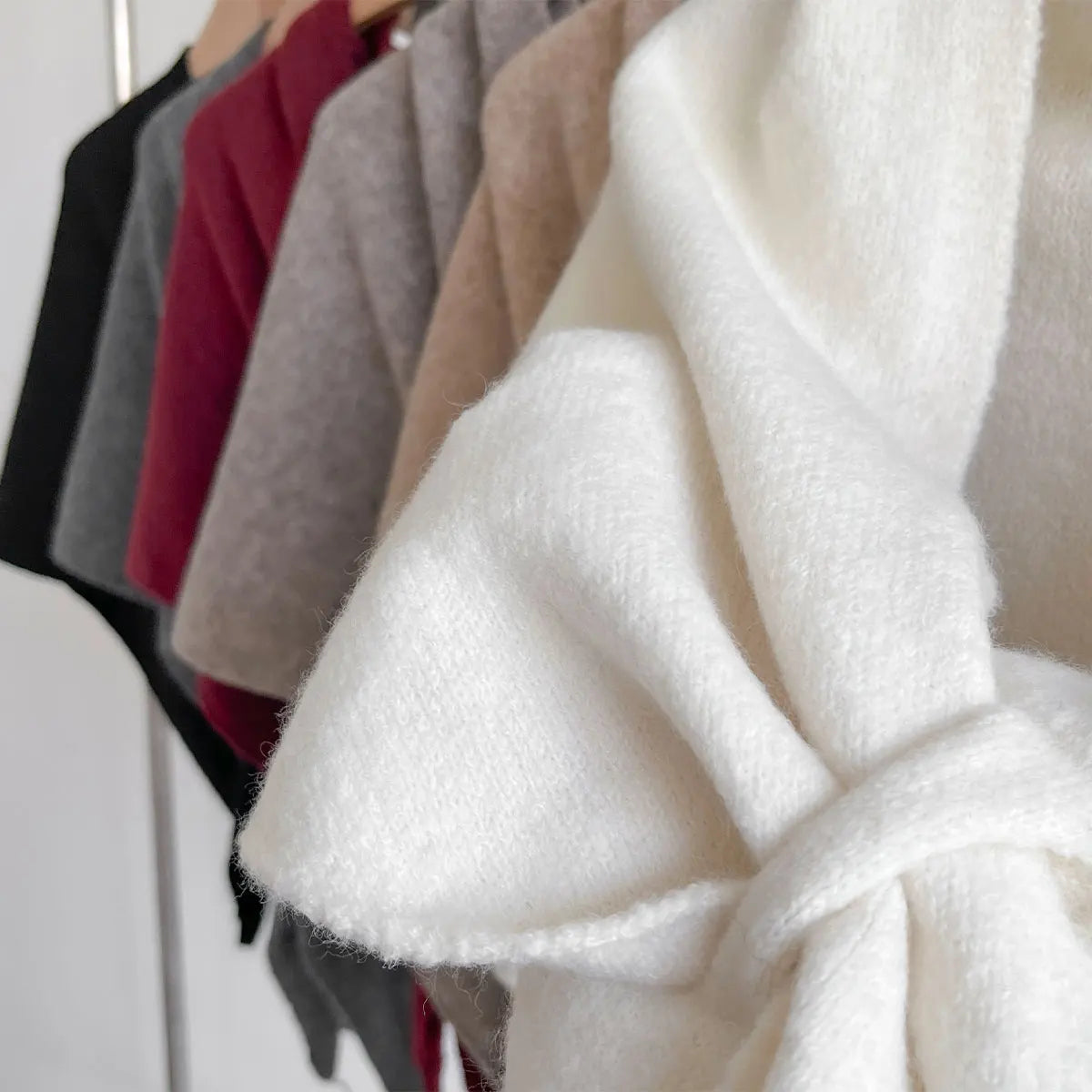 The Fleece Shawl With Elegant Draping And Lightweight Warmth