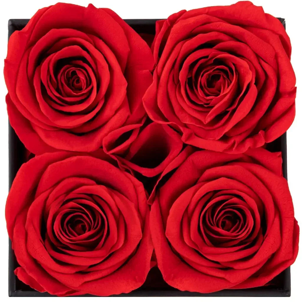 Elegant blomsterarrangemang med rosor – dekorativ visningsask