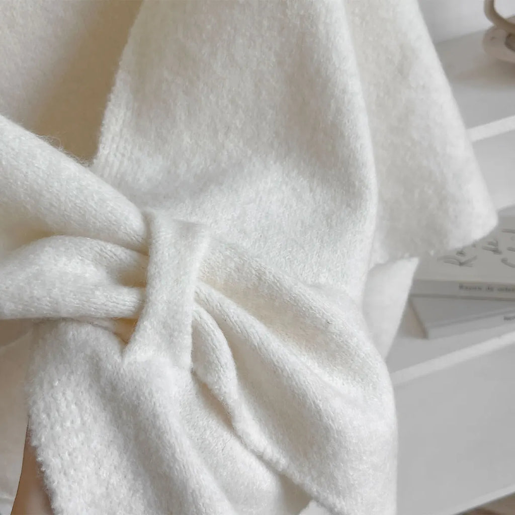 The Fleece Shawl With Elegant Draping And Lightweight Warmth