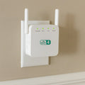 WiFi-forlænger og rækkeviddeforstærker - netværksrepeater til stikkontakt