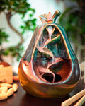 Backflow Incens With Oriental Design Creating A Downward Smoke Cascade For Relaxation